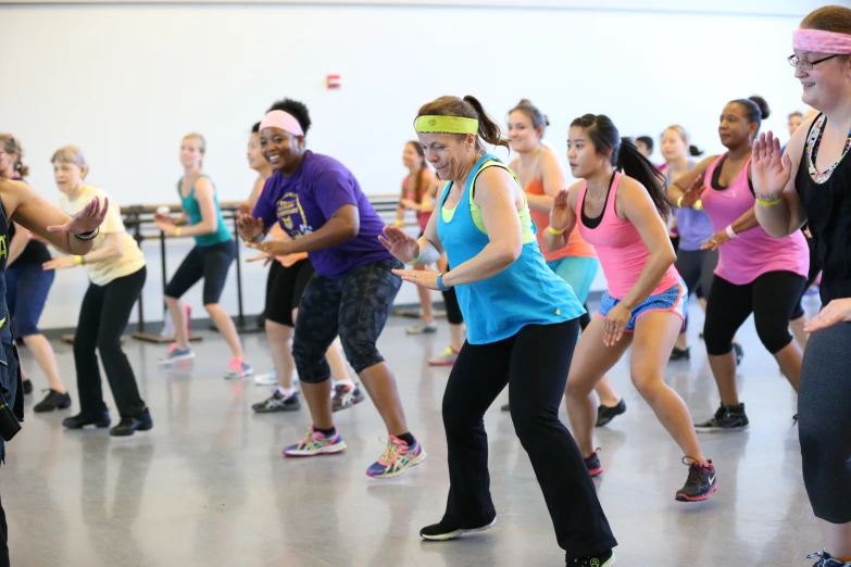 young people dance while listening to the music