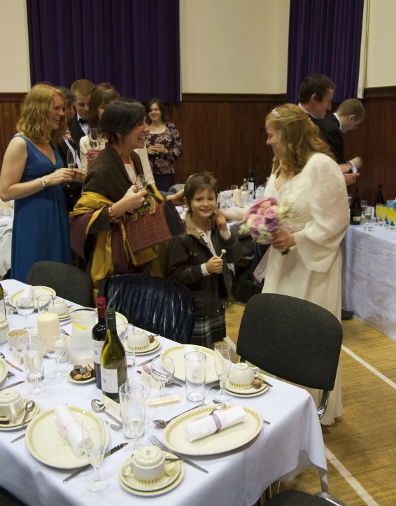 the tables are full of wine and silverware