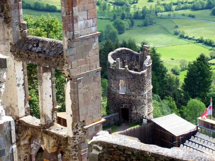 the ruined stone building overlooks the valley