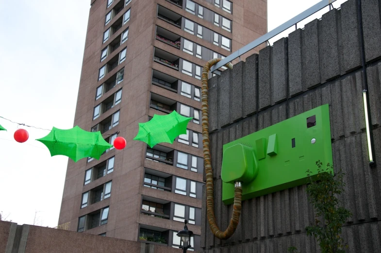 a large christmas decoration on the side of a building