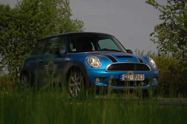 the small car is driving around in the field