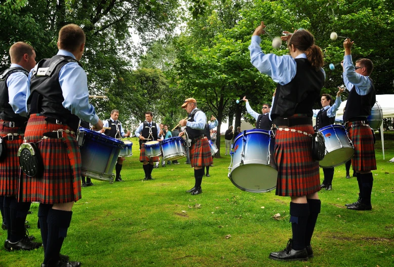 a group of young people playing musical instruments