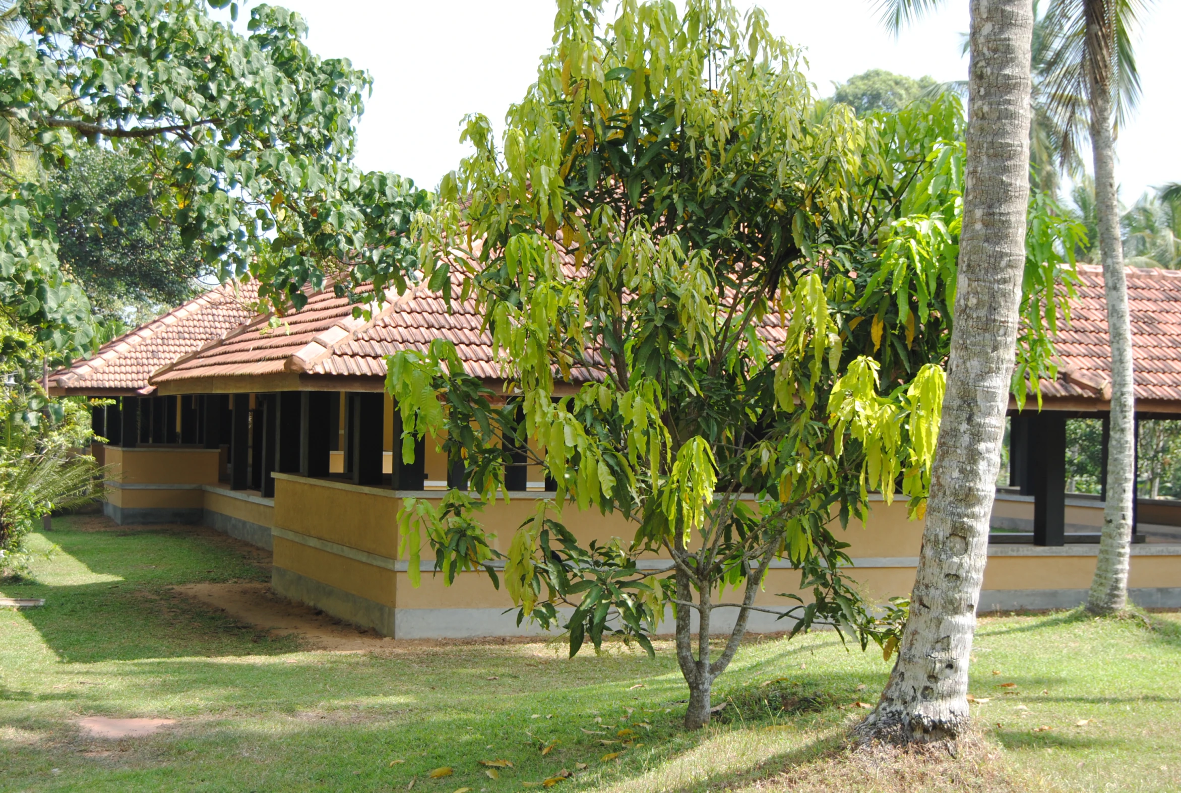 a picture of a home with a brown roof