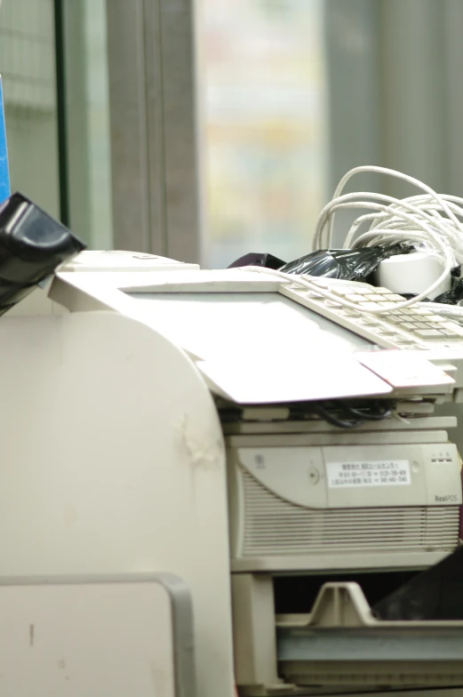 a printer and a monitor sit on display