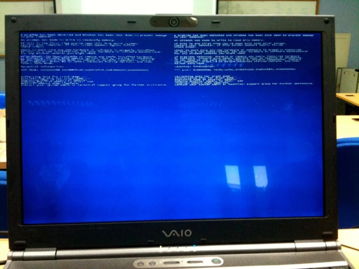 a computer screen with blue light coming down