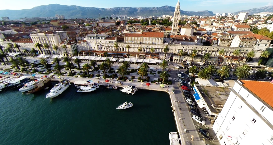 a body of water with boats docked at the shore