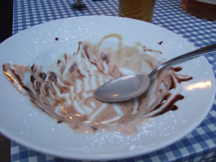 a plate with dessert sits on a table