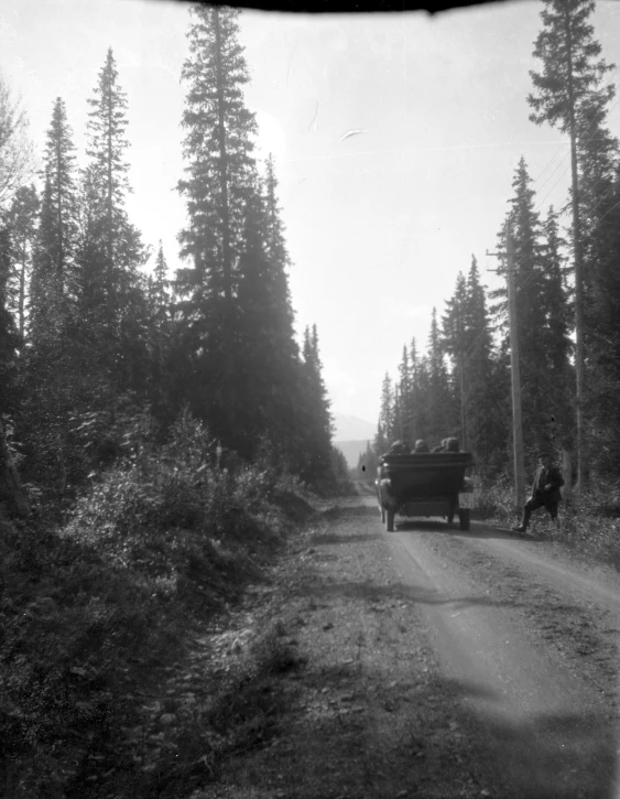 a black and white po of a vehicle on a road