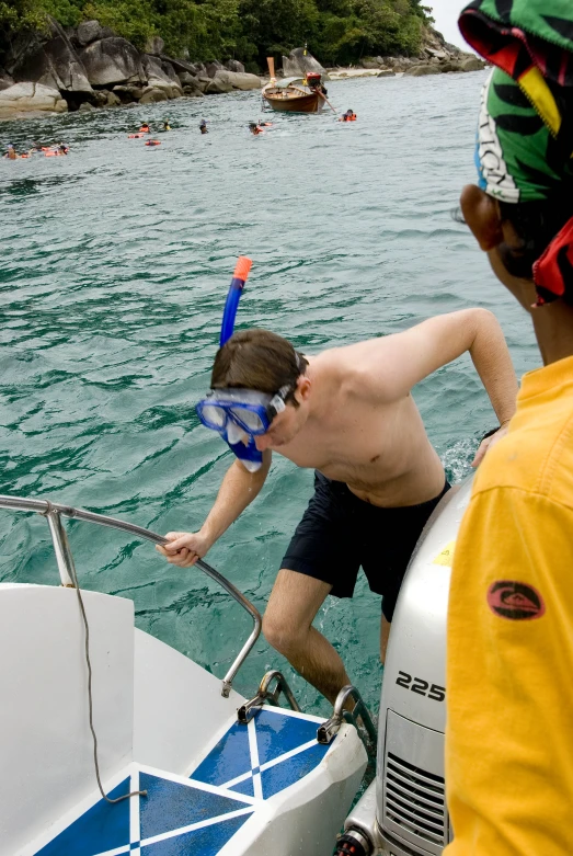 a man with his neck mask in the water