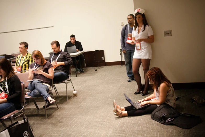 students are in their classroom for a lecture