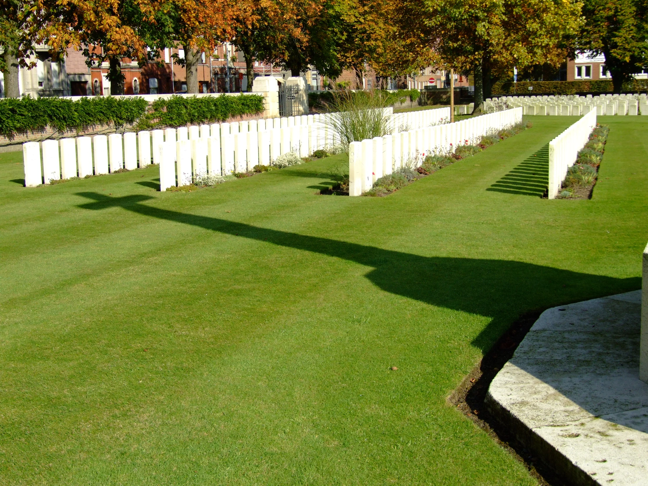 an image of a graveyard on a lawn