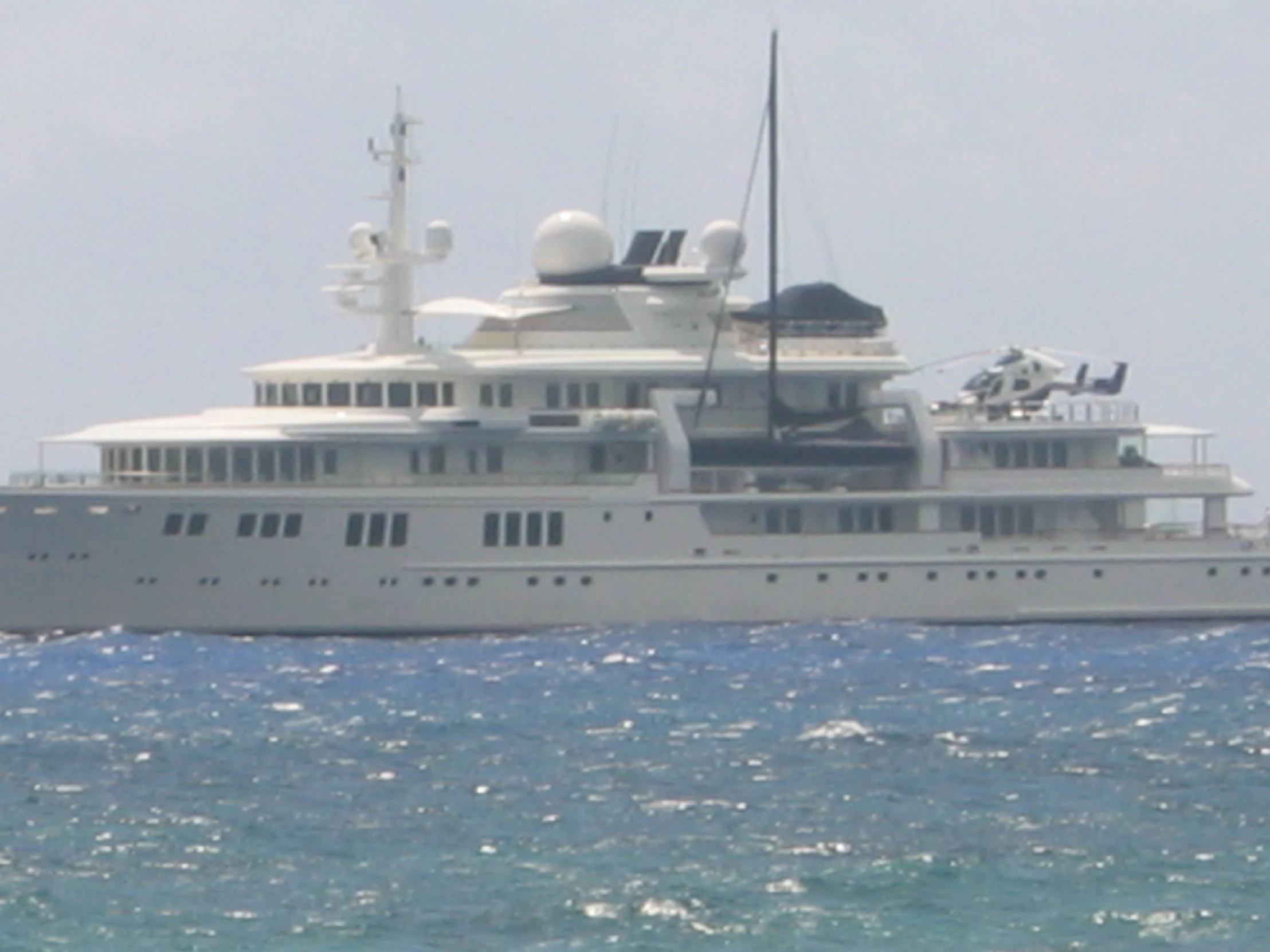 a white boat that is out in the water