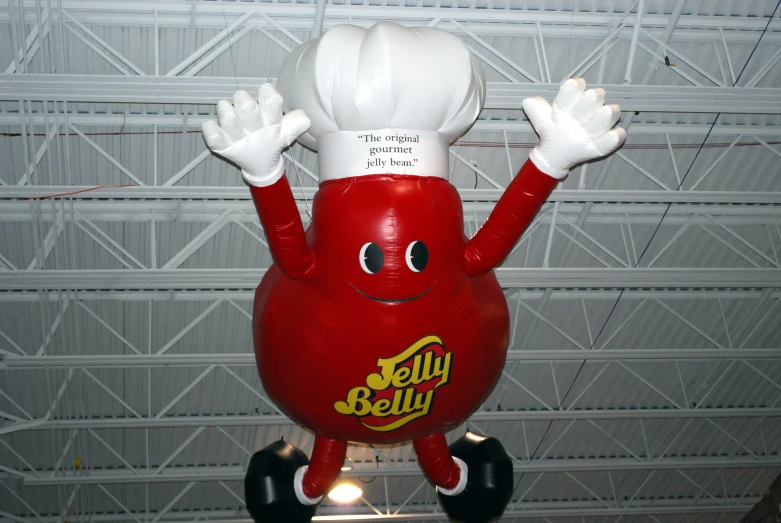 a plastic toy with a chef's hat on top of it