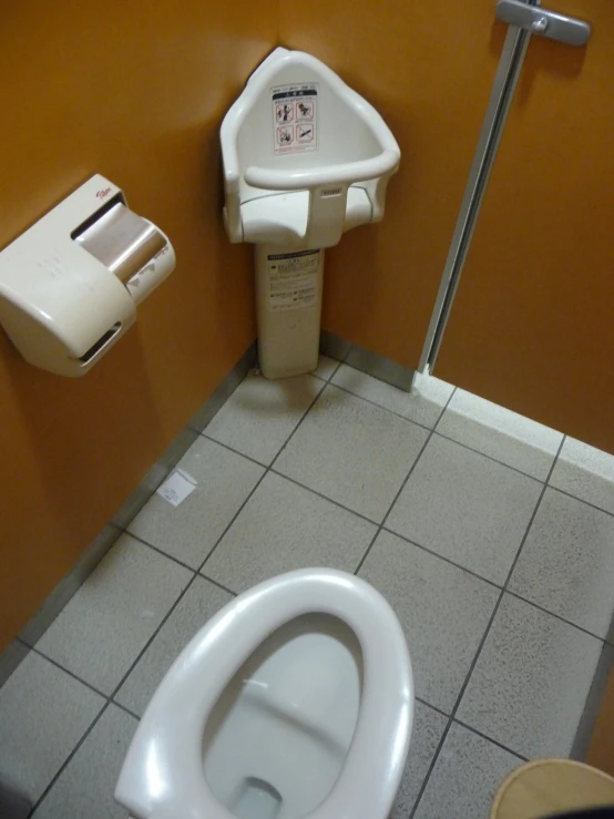 a toilet that is sitting in a bathroom