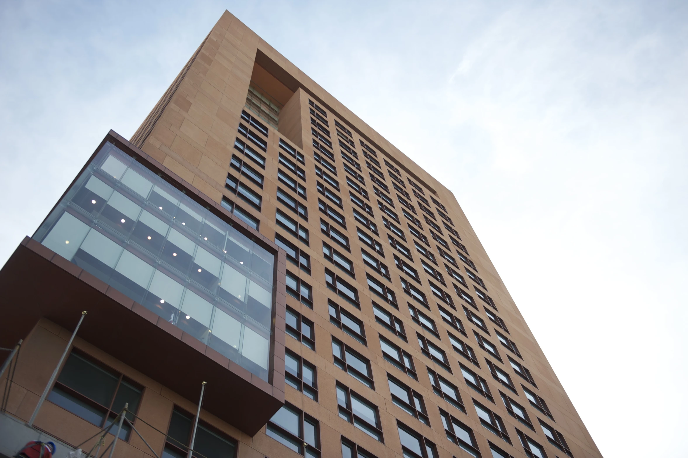 a very tall building with some windows by the top