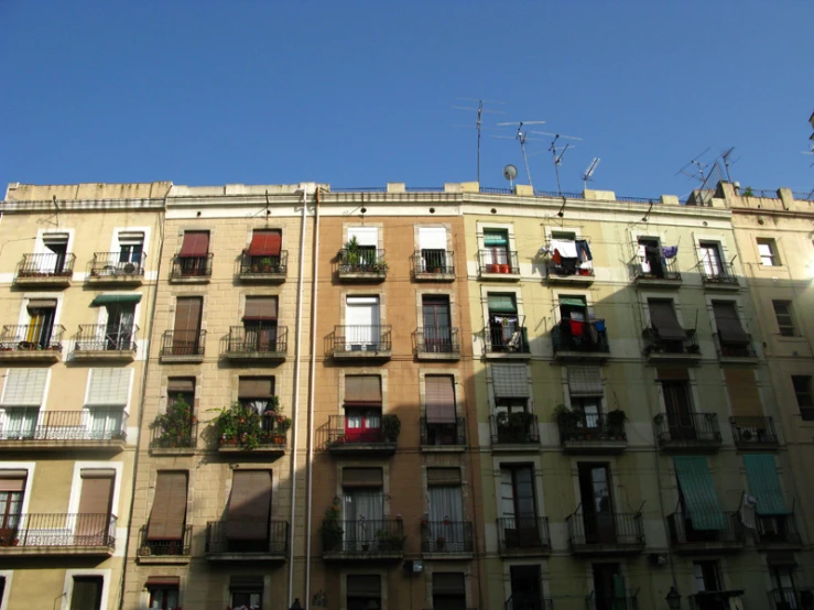 apartment buildings are all over the city on sunny day