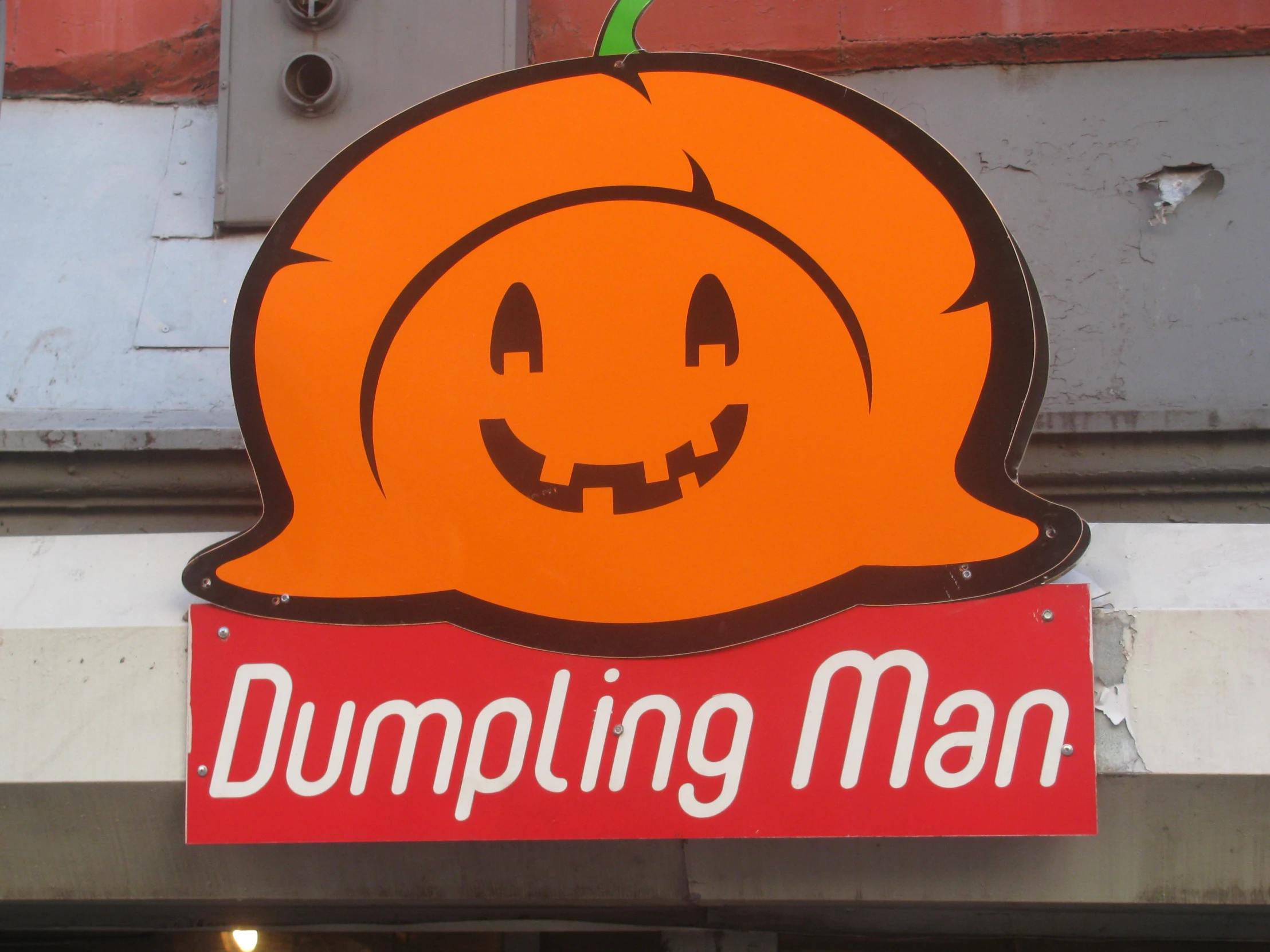 a large sign on a building says dumping man