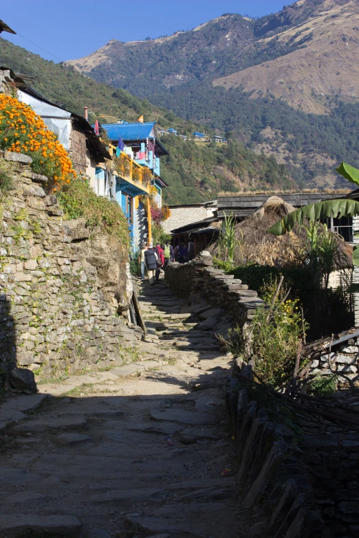 a street with steps that lead up to mountains