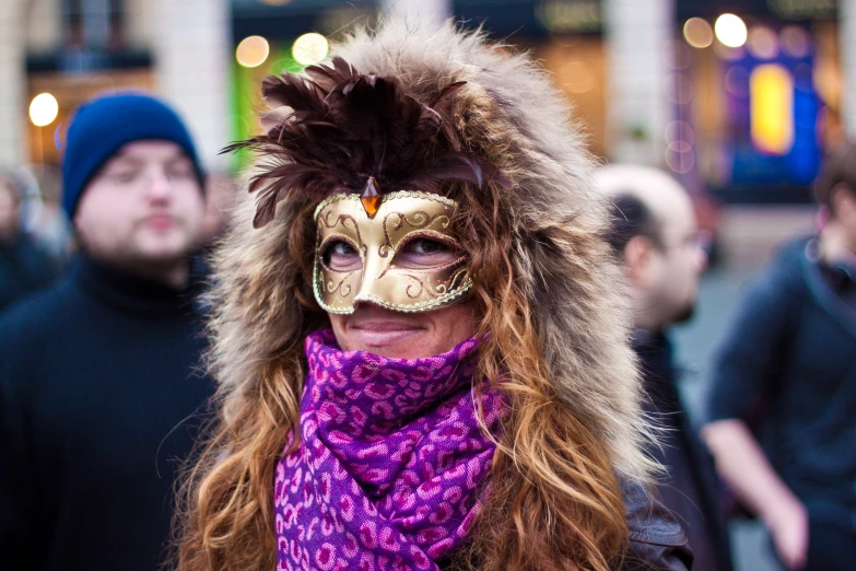 woman with a mask in the street during the holiday