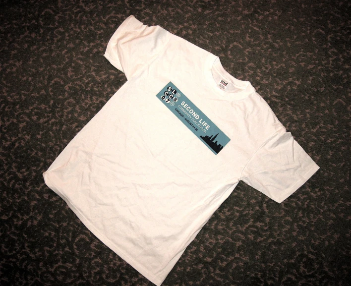 a white tshirt with a black and blue tag