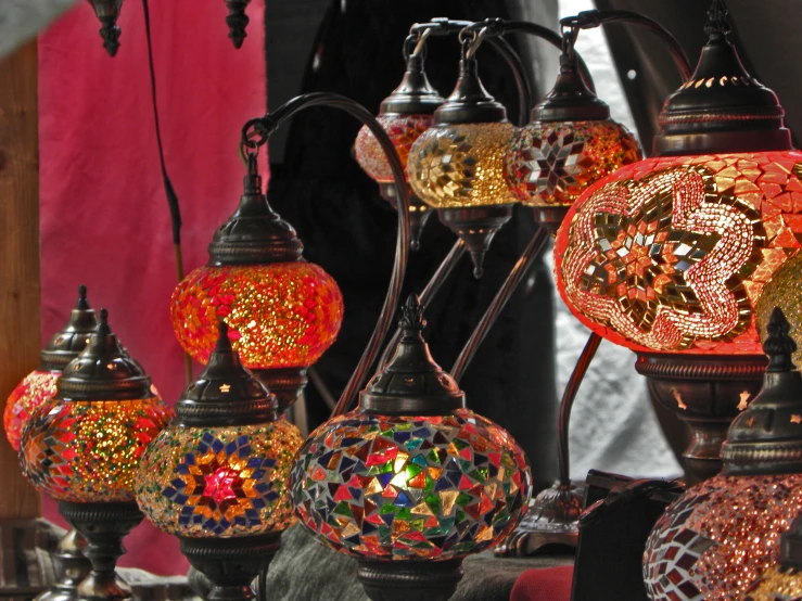 decorative lanterns are displayed for sale in the shop