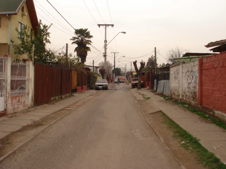 cars and trucks are traveling down the street