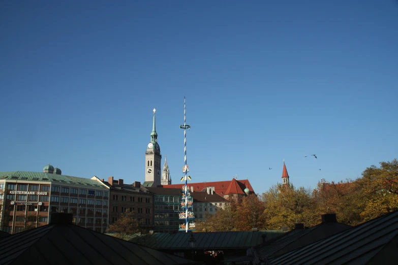 the skyline of an european city with tall buildings