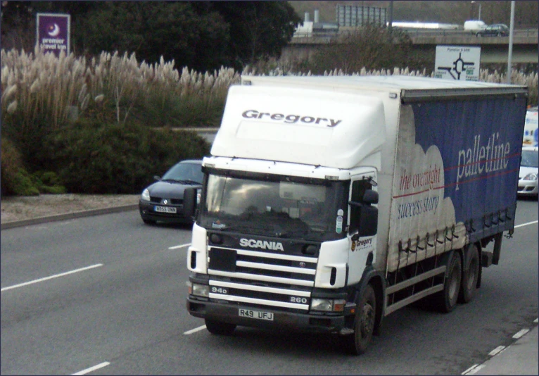 a truck that is sitting in the road