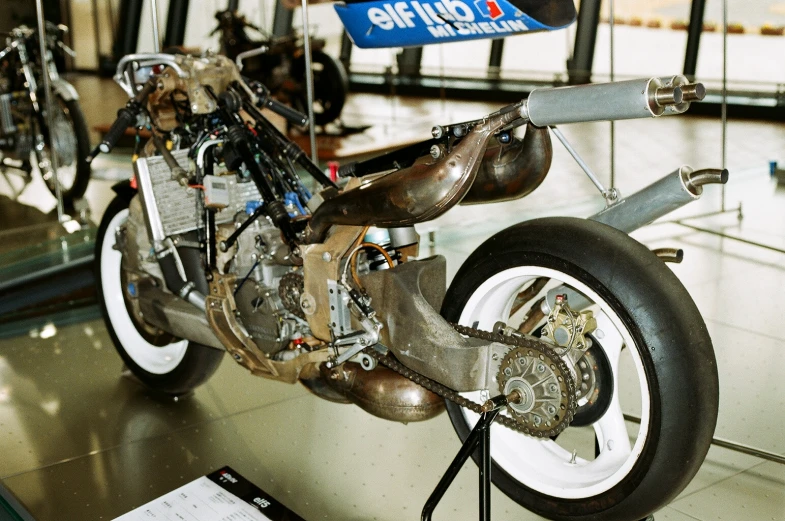 motorcycle with very unique engine parked in a display