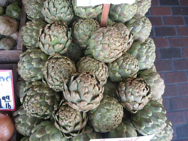 the fresh artichokes are for sale at the market