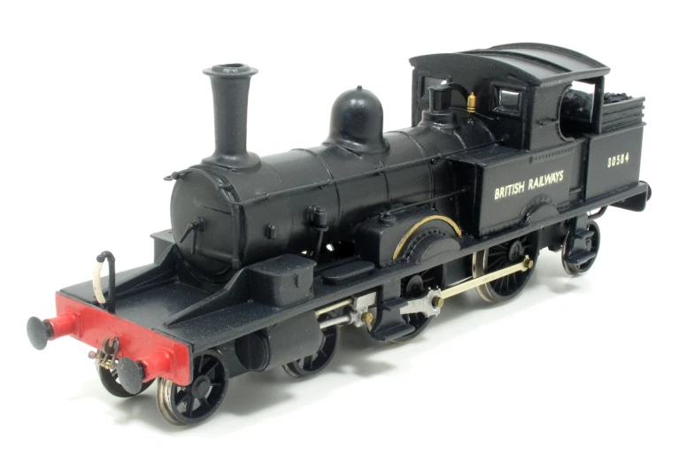 a toy train is shown with black engine