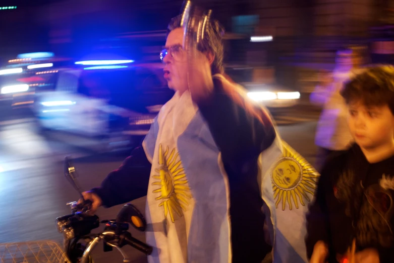 two guys with crowns walking down a street