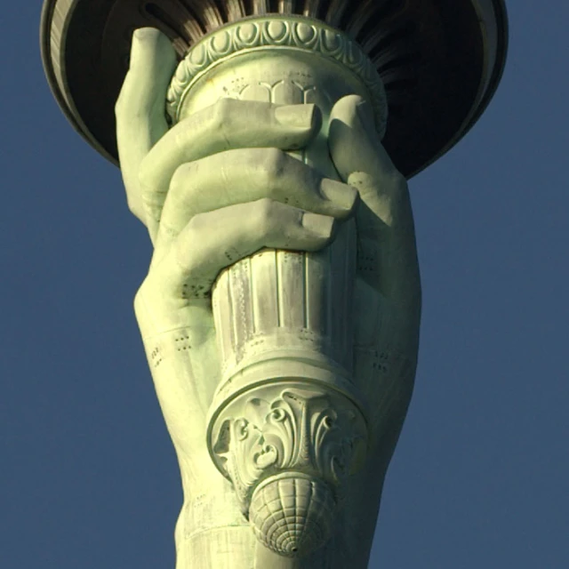 a statue that has a small light up on it