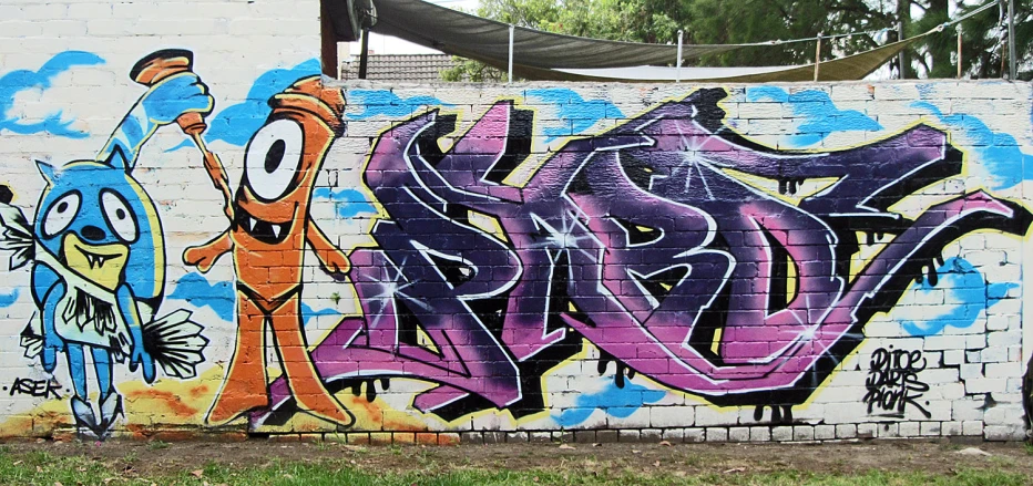 a wall with colorful graffiti is pictured in this po