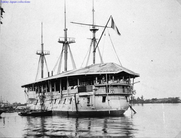 a very old looking boat in a body of water