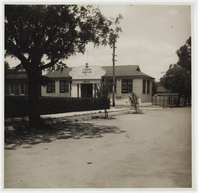 a small building with a car parked outside