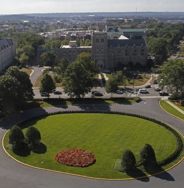 a large green park in the middle of town