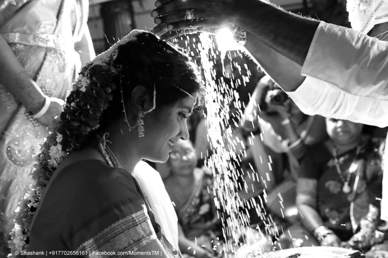 a girl and groom holding on to sparklers at their wedding