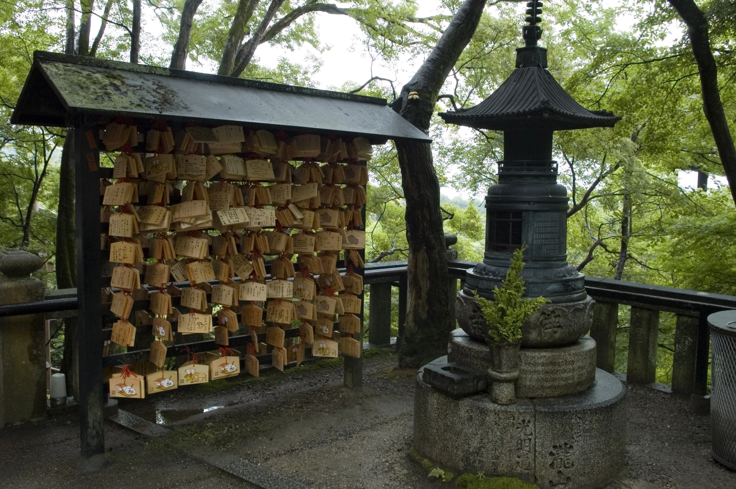 a display is displayed on the top of a wooden railing