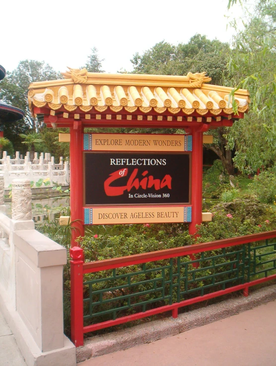 the red and gold chinese pavilion displays an extra large sign