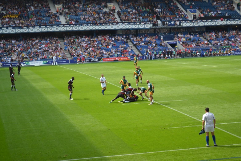 a team of professional soccer players are on the field