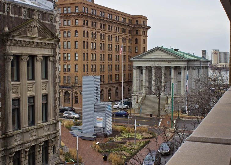 an image of the view of some buildings from a window