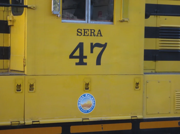 the door on a train car with the number 477
