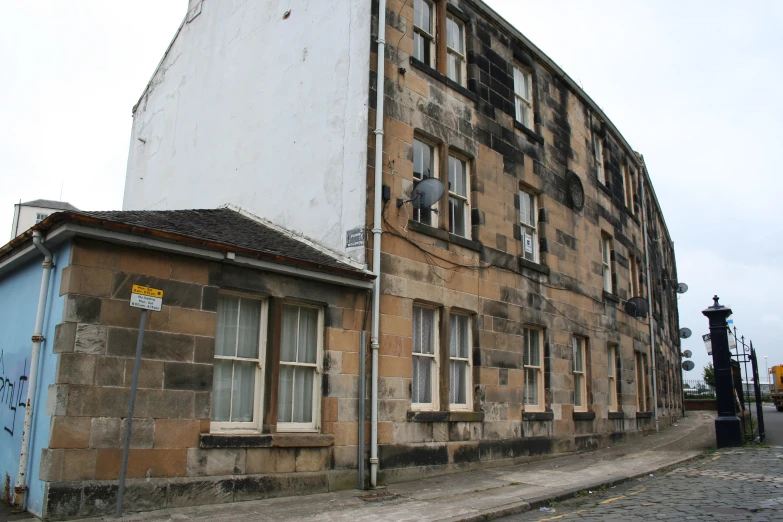 the building is rundown and has some graffiti on it