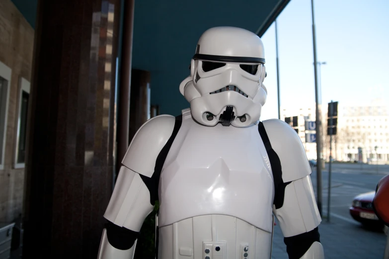 a storm trooper dressed in white in a brick building