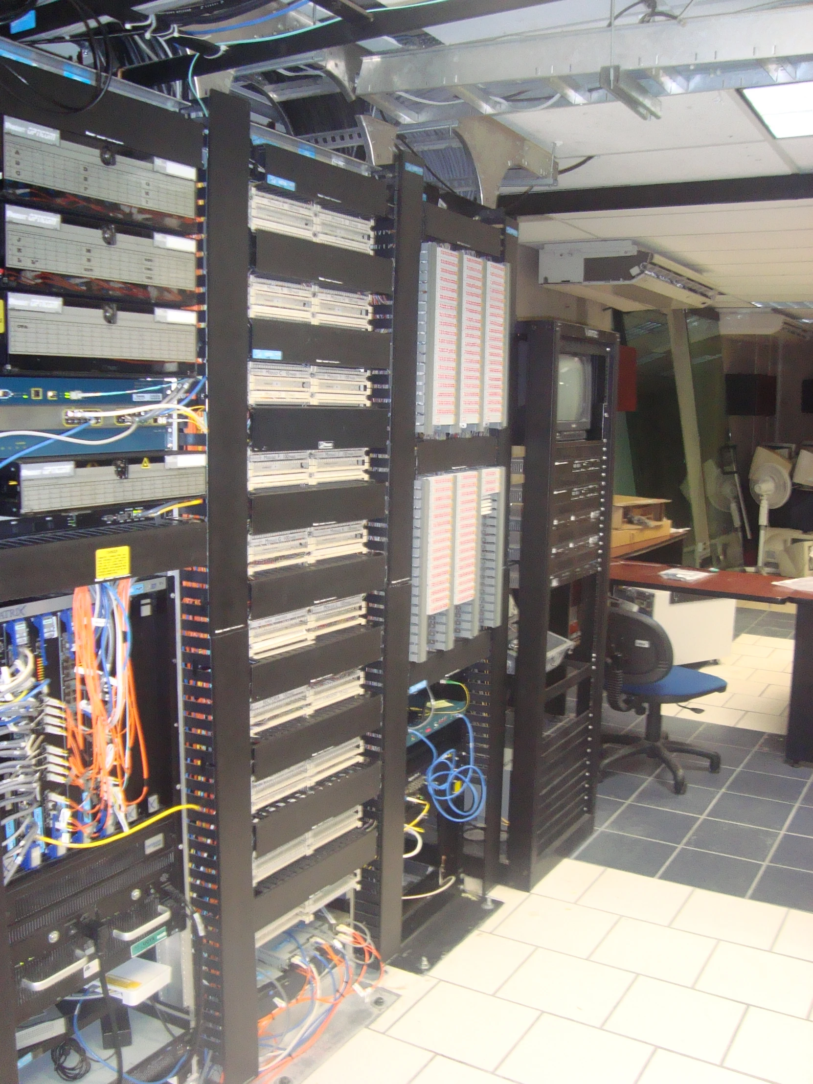 several computer parts stored in rows and in the room