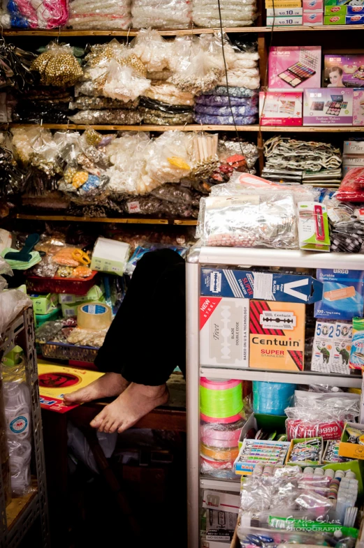 a worker stands inside his warehouse for repair