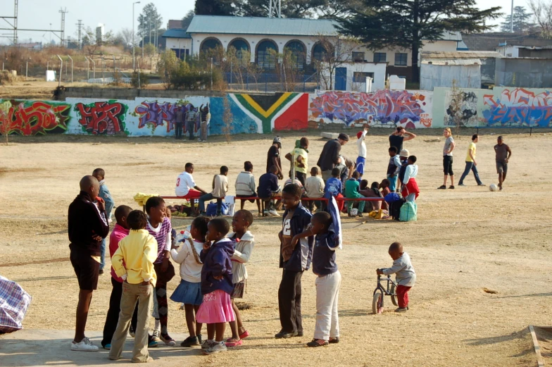 the children are in the open field playing