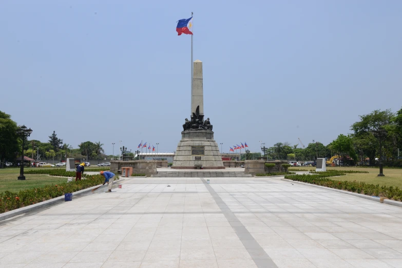 a large monument in the middle of the park