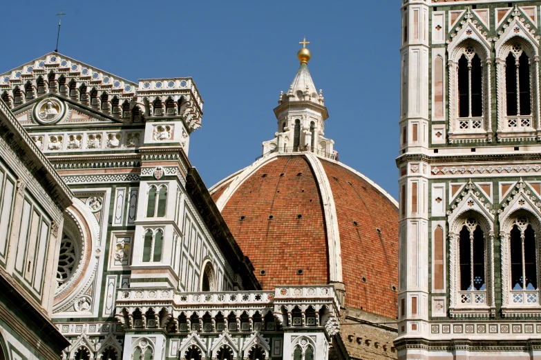 some architectural work on the top of some buildings